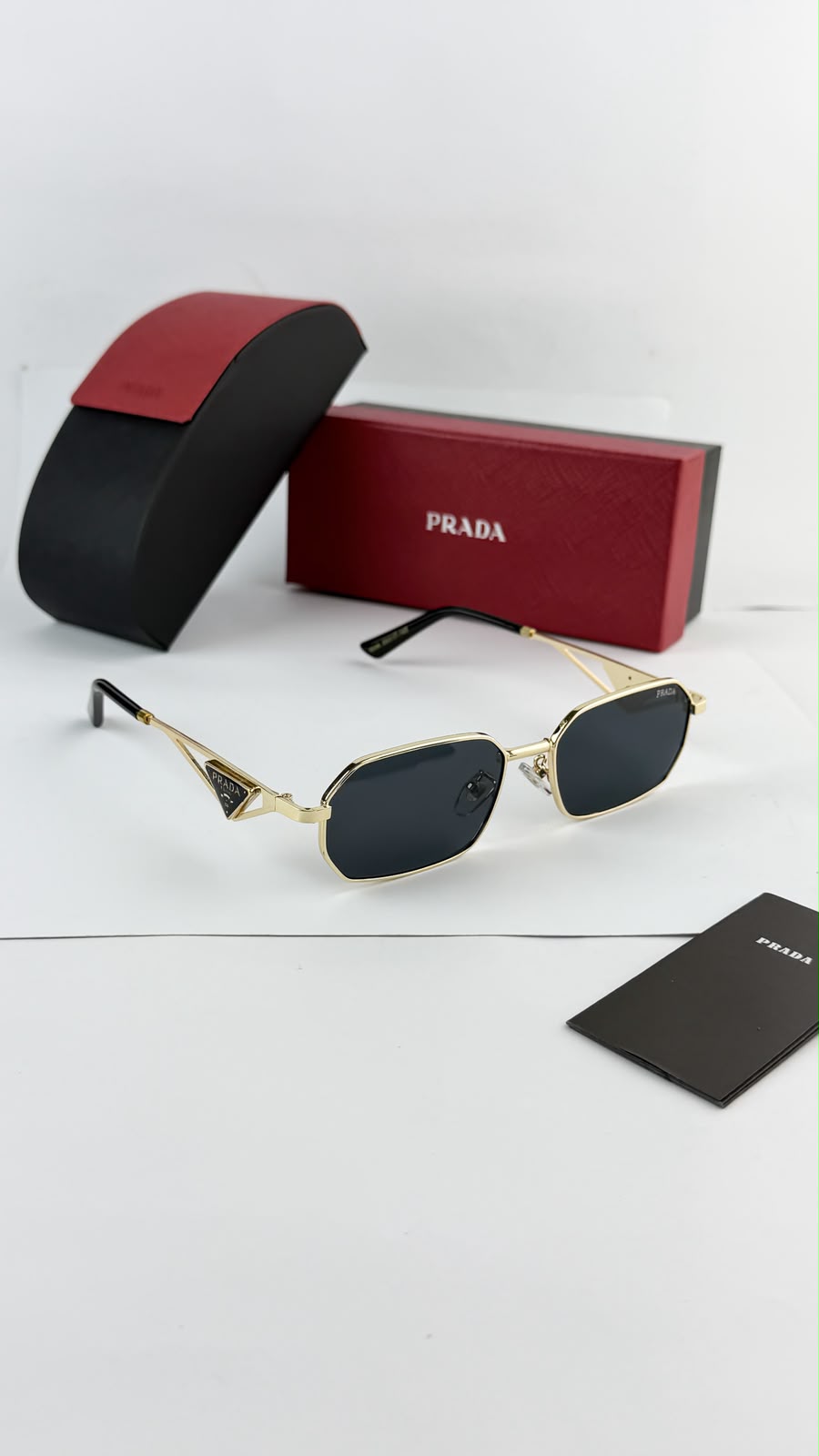 Prada Geometric Gold Black Unisex Sunglasses
