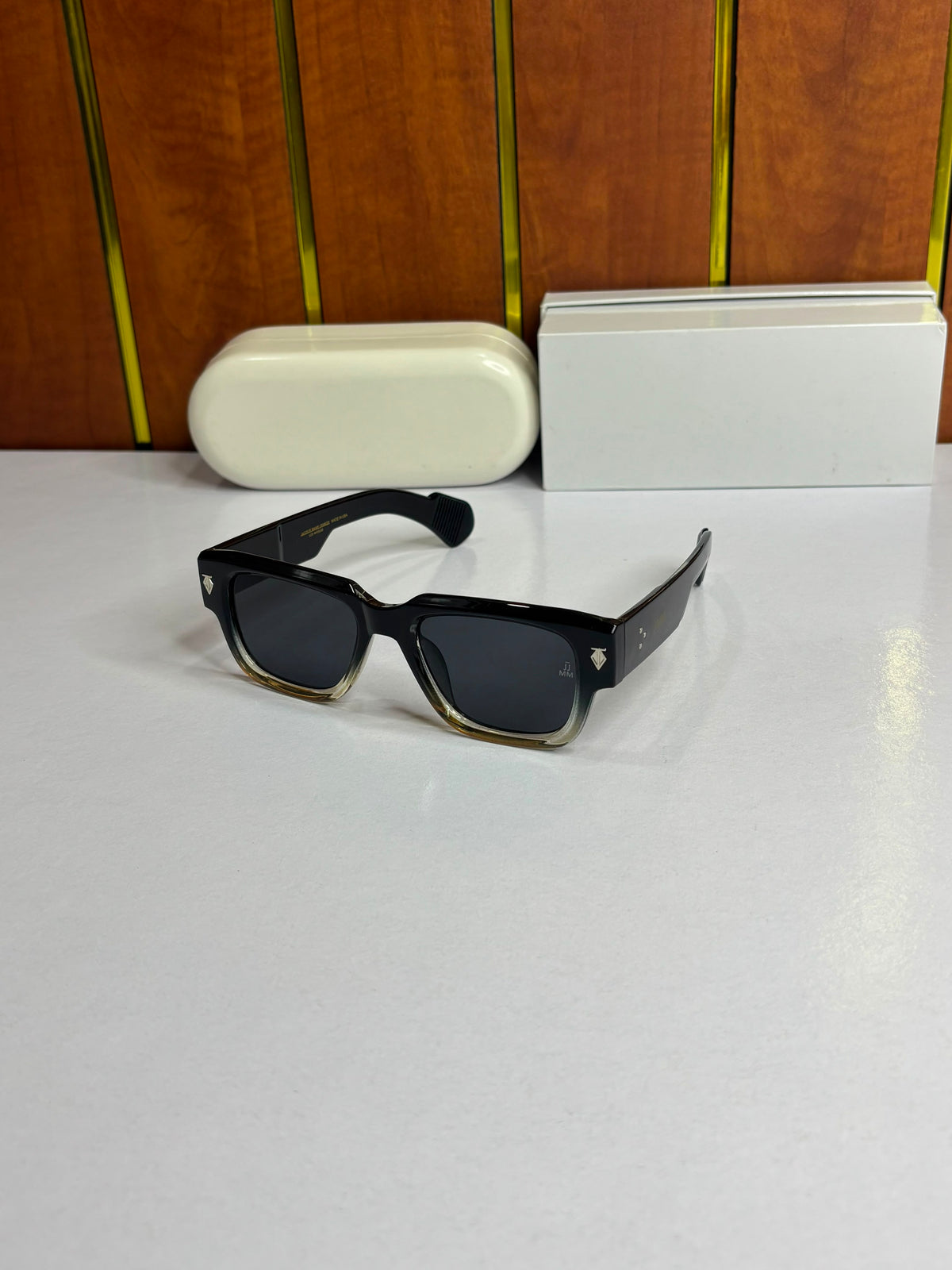 Jacques Marie Mage Molino Unisex sunglasses featuring a bold black-to-clear gradient