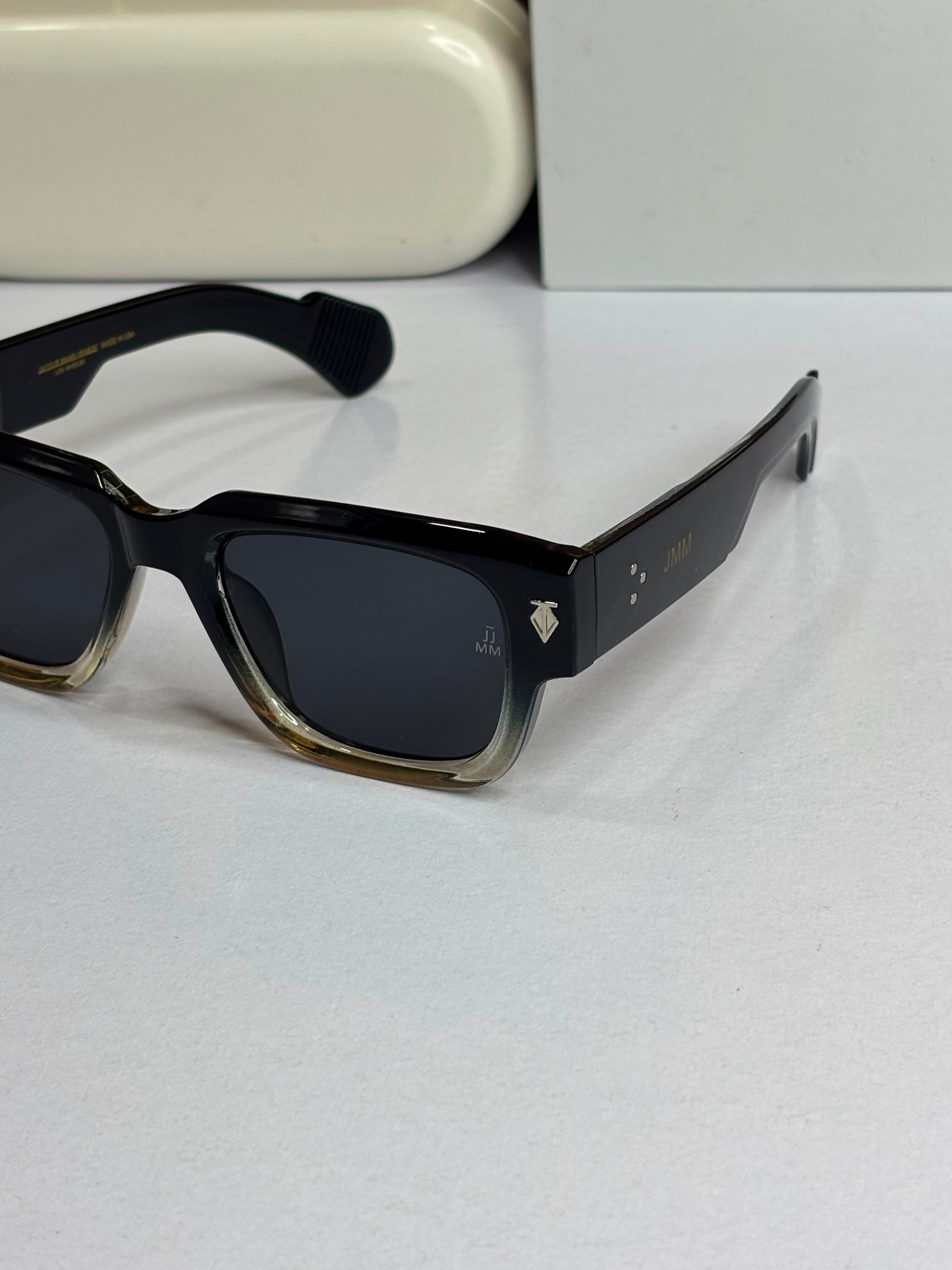 Jacques Marie Mage Molino Unisex sunglasses featuring a bold black-to-clear gradient