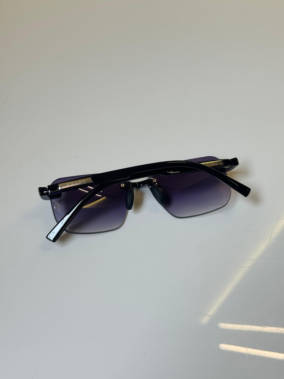 Prada Rimless Purple Gradient Tint Unisex Sunglasses