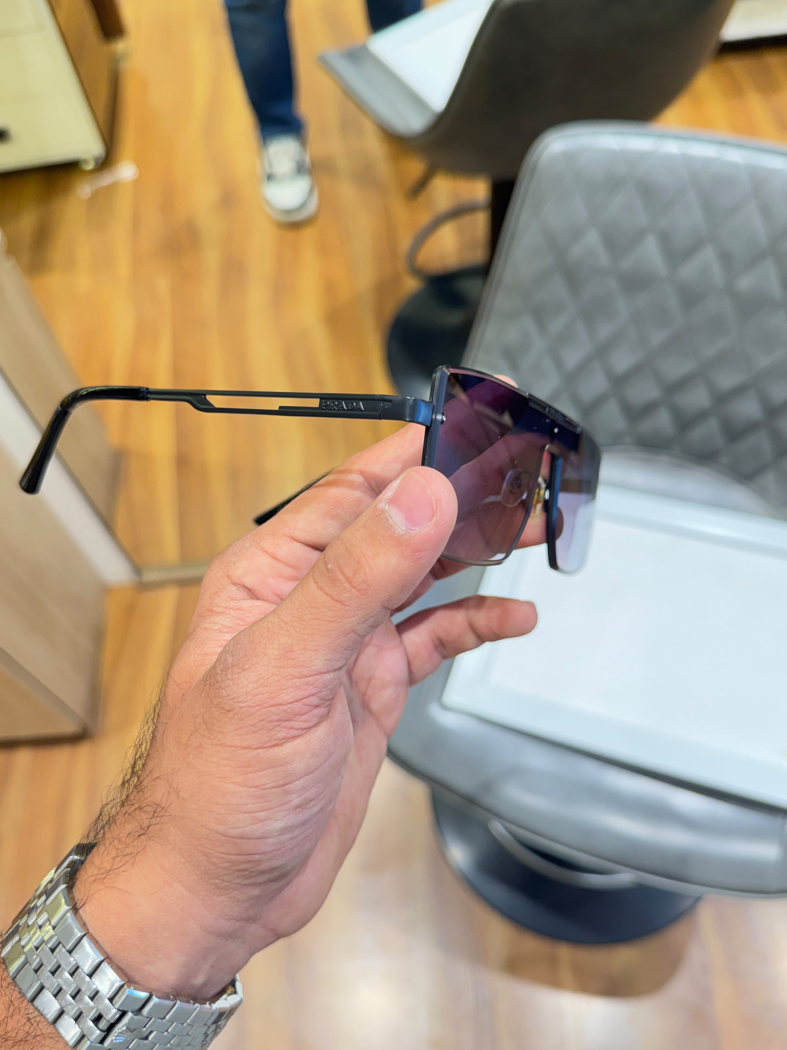 Prada semi-rimless featuring dark gradient lenses Women sunglasses